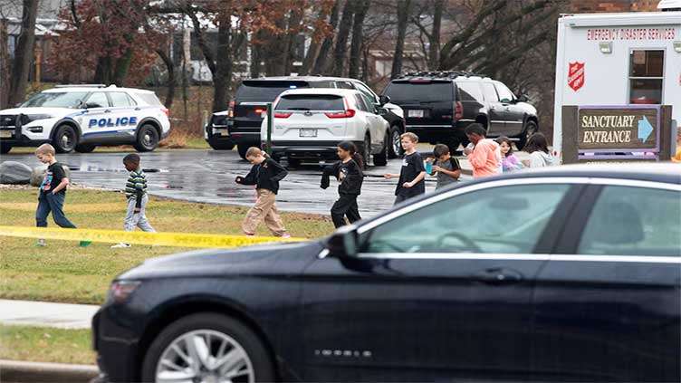 Teenage girl shoots dead fellow student and teacher at Wisconsin school