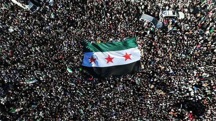 'Syria freed!': thousands cheer at famed Damascus mosque