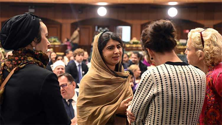 Malala says overwhelmed to be back in Pakistan