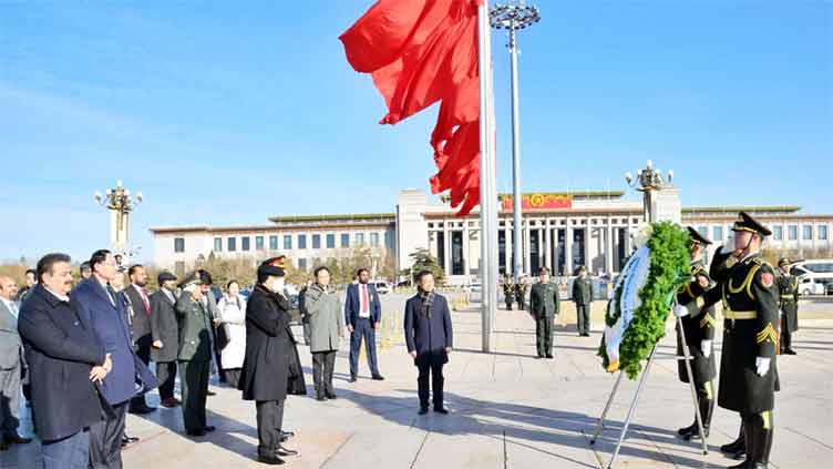 President Zardari visits memorial of Chinese national heroes in Beijing